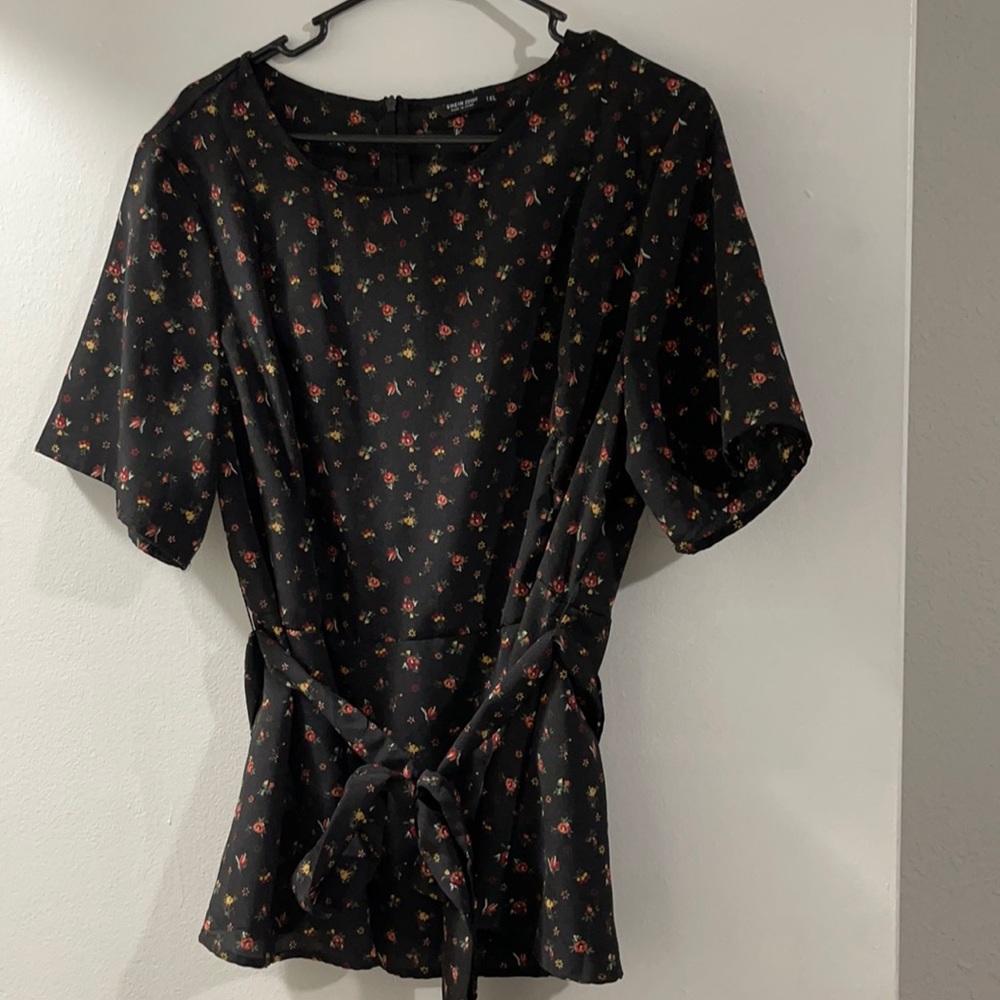 New- never worn black top with flower print.